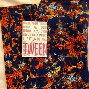 Lularoe Leggings Tween Black w/ Orange background